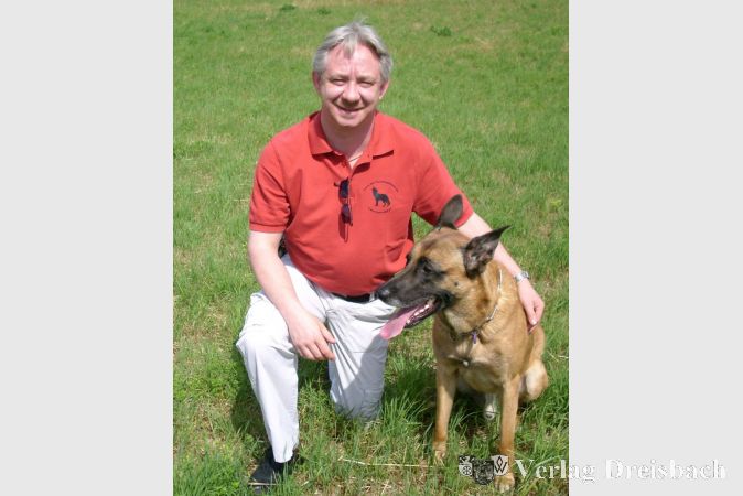 Hundetrainer Peter Groh mit seinem Hund Dio.