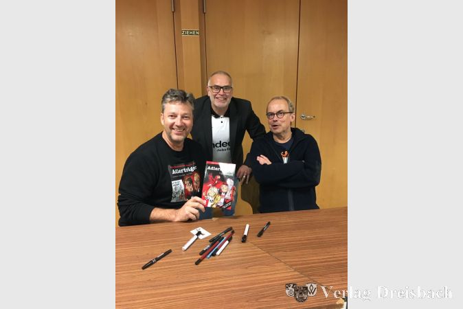 Entspannte Gesichter nach der Veranstaltung beim Signieren: Michael Apitz, Clemens Weißenberger und Henni Nachtsheim (v. l. n. r.).