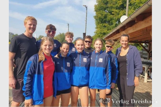 MTS-Team mit Olympiasieger Jonas Reckermann und Beachvolleyballerin Victoria Bienek.